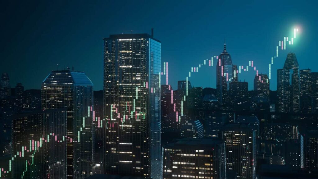 Lights glow in a cityscape at night.